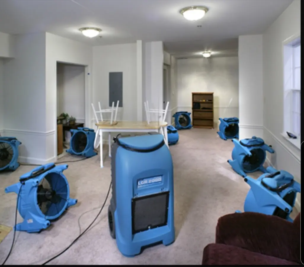 Air movers and dehumidifier setup for Water Damage Restoration in Earlimart
